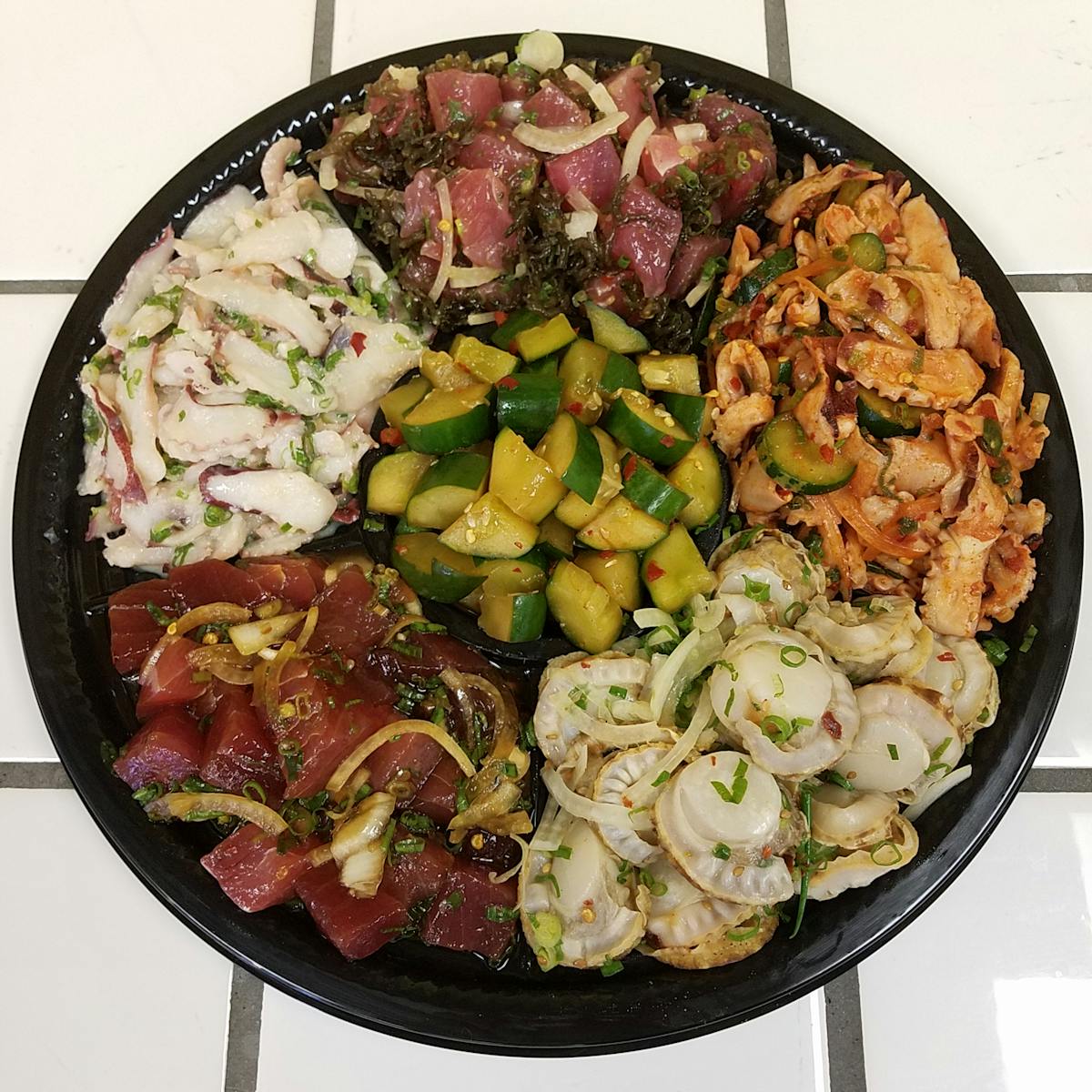 a pizza sitting on top of a plate of food